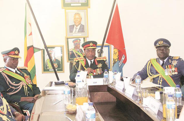 Army bosses at meeting - FILE